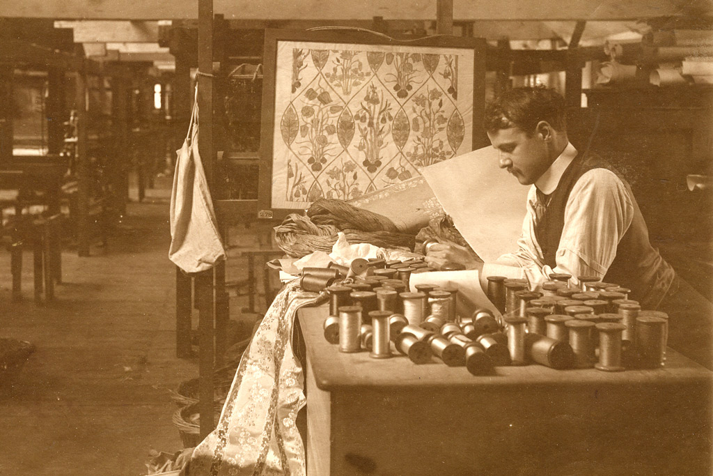 Reginald-Warner-inspecting-silk-thread